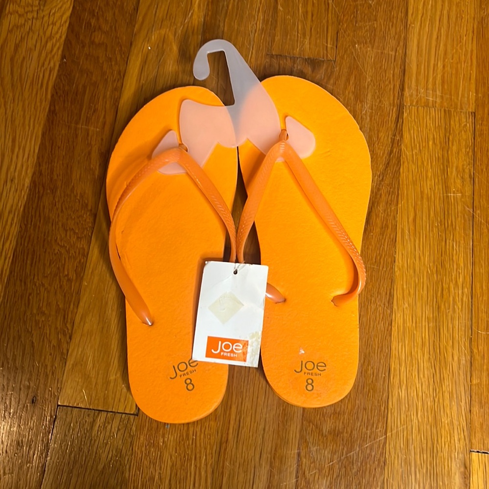 Women’s new flip flops by Joe size 8 orange